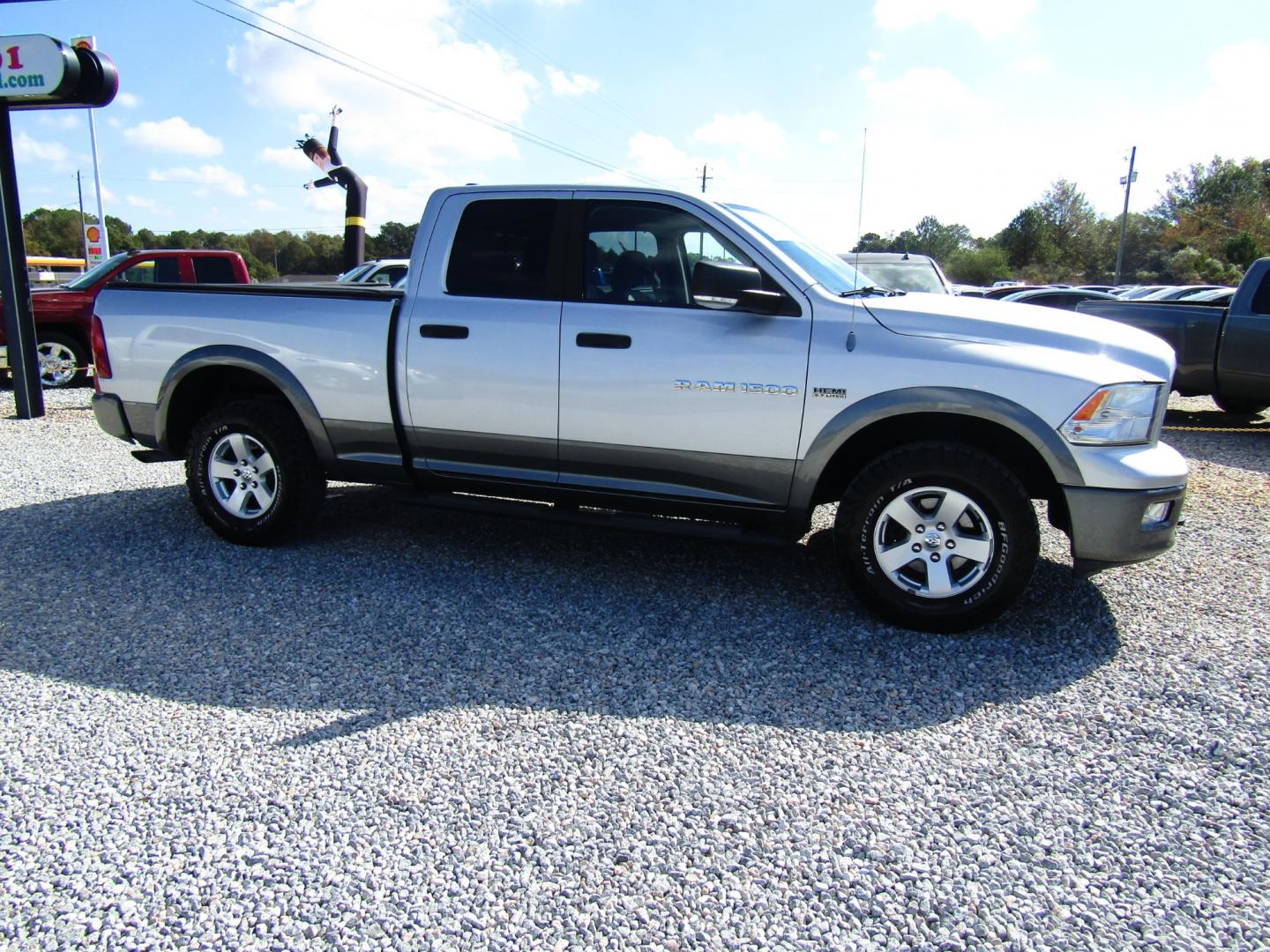 2011 Silver Dodge Ram 1500 Sport Quad Cab 4WD (1D7RV1GT9BS) with an 5.7L V8 OHV 16V engine, Automatic transmission, located at 15016 S Hwy 231, Midland City, AL, 36350, (334) 983-3001, 31.306210, -85.495277 - Photo#0